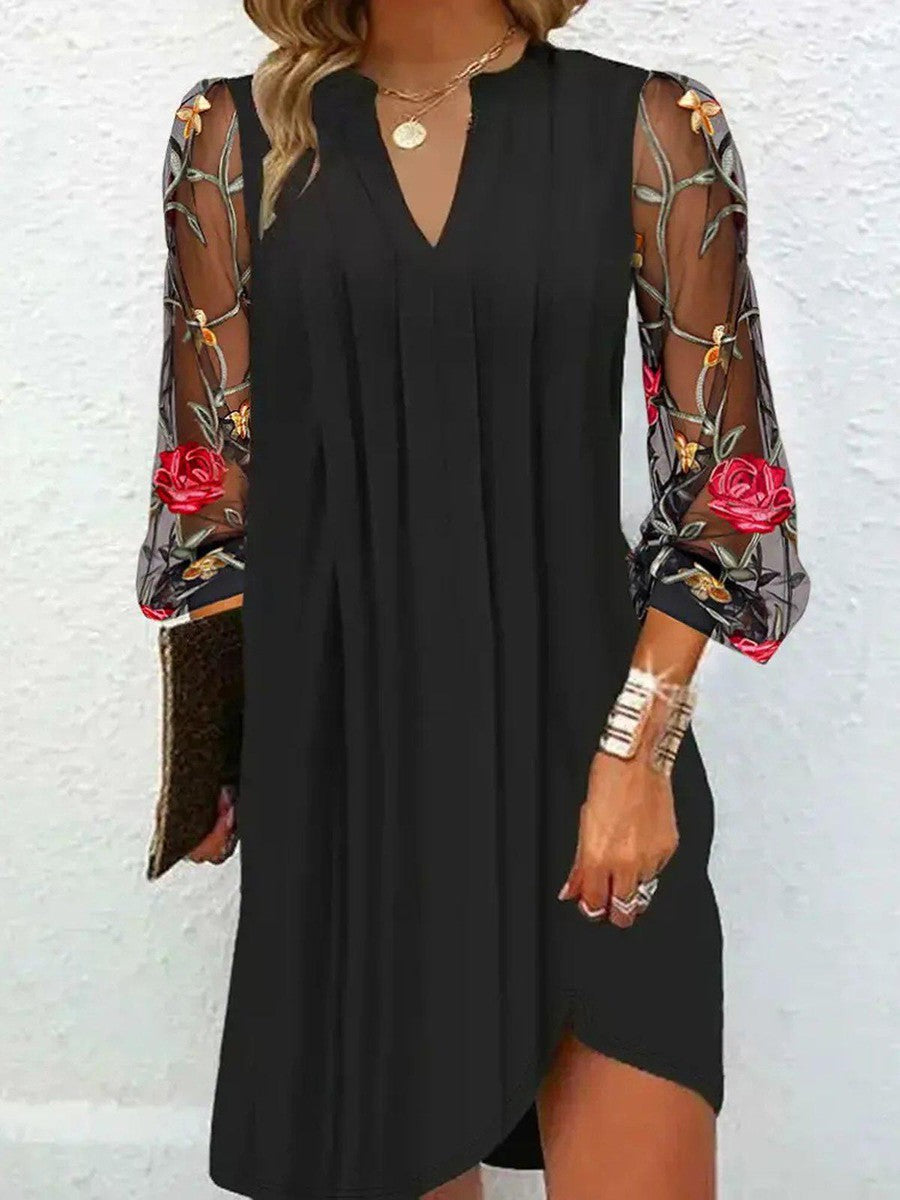 Women's elegant mini dress with V-neck and transparent