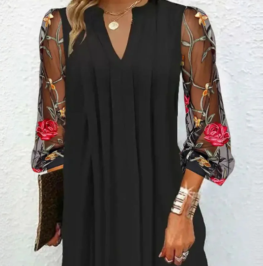 Women's elegant mini dress with V-neck and transparent